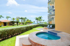 Beachfront - Garden Delight 3BR condo - E125